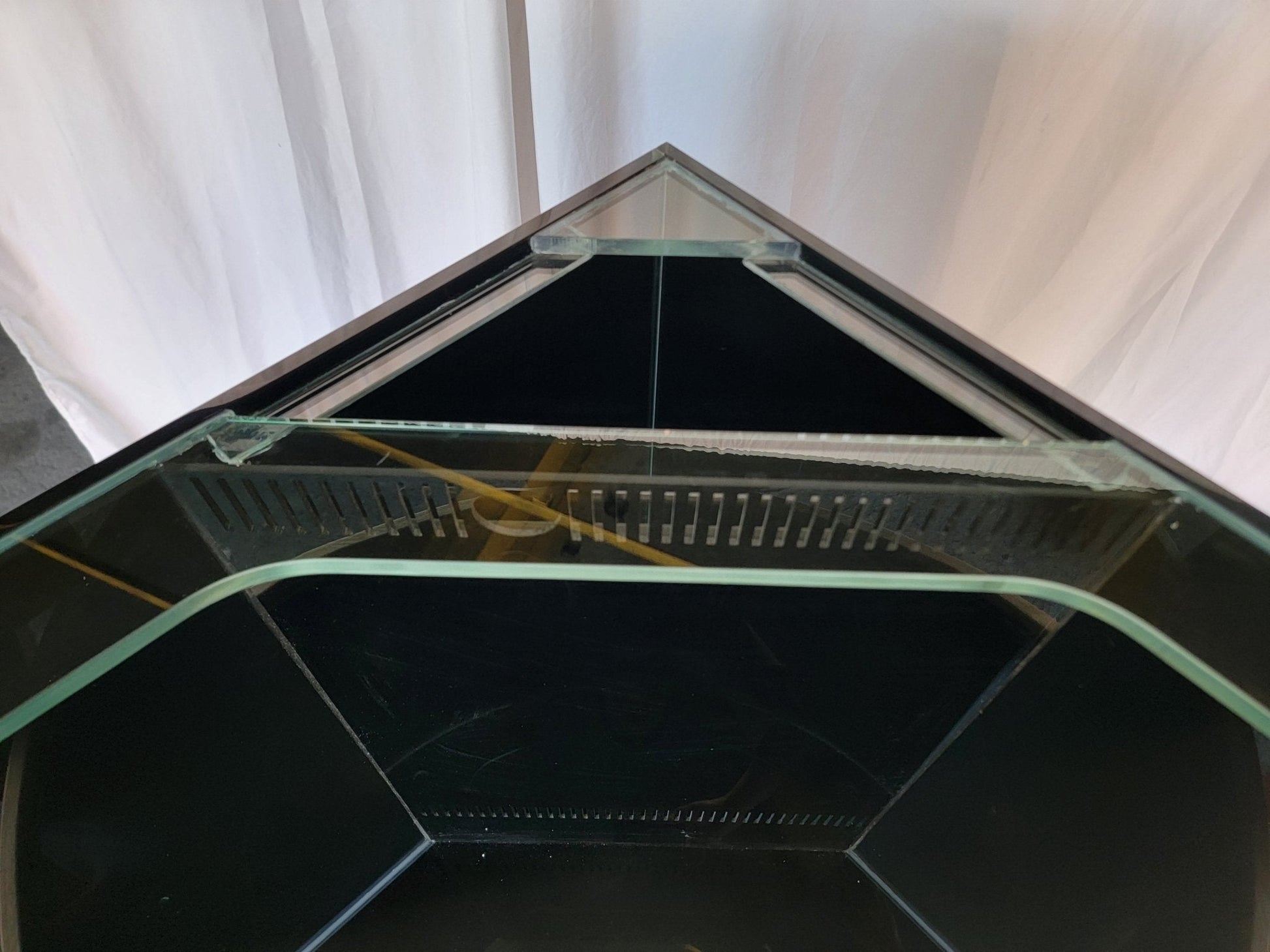 Glass panel with a metal frame on a white background