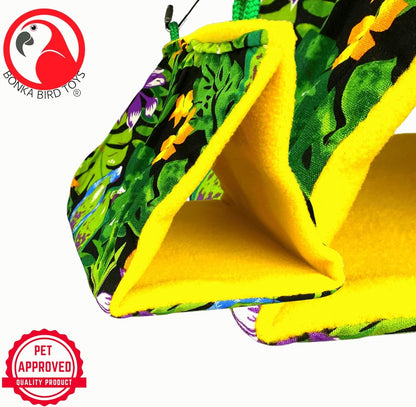 Colorful bird toy with leaf pattern and yellow interior, featuring Bonka Bird Toys logo.