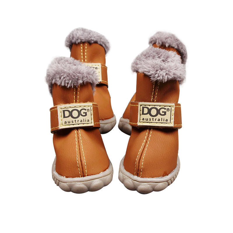 Pair of brown dog boots with gray fur toppers on a white background, branded 'Dog Australia'.
