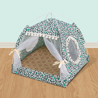 Pet tent with leopard print design on a wooden floor against a light blue wall.