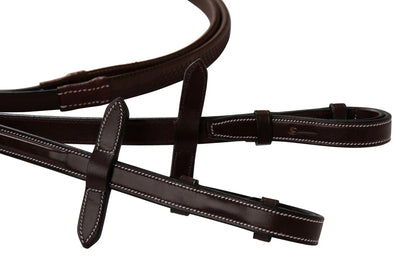 Brown leather bridle on a white background