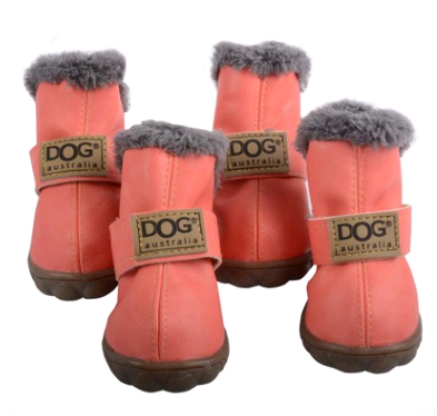 Set of four coral dog boots with gray fur trim and visible 'Dog Australia' branding on a white background.