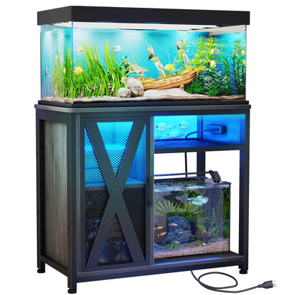 Fish tank with aquatic plants and fish, placed on a stand with additional tanks inside.