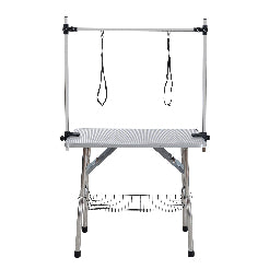 Pet grooming table with hanging arms on a white background