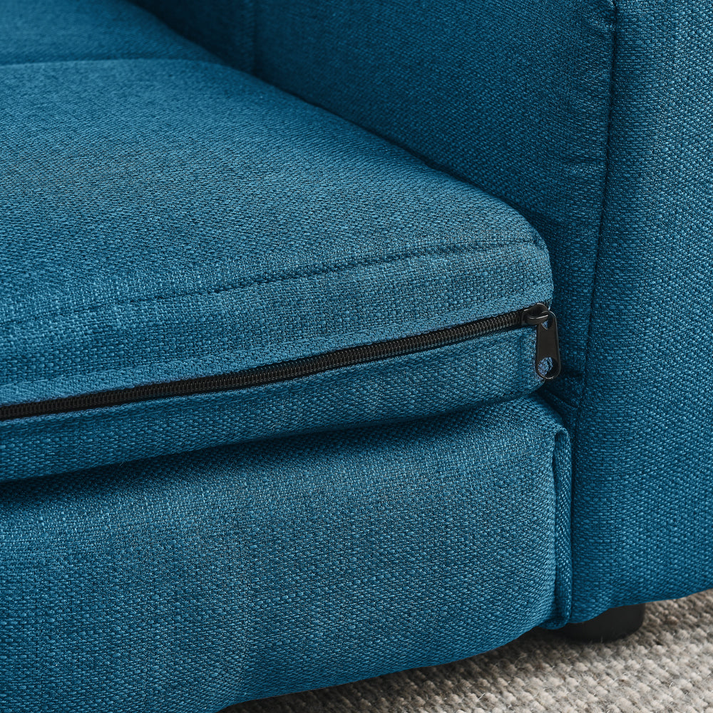 Close-up of a blue fabric chair with a zipper detail.