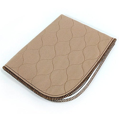 Beige quilted blanket with wavy pattern on a white background