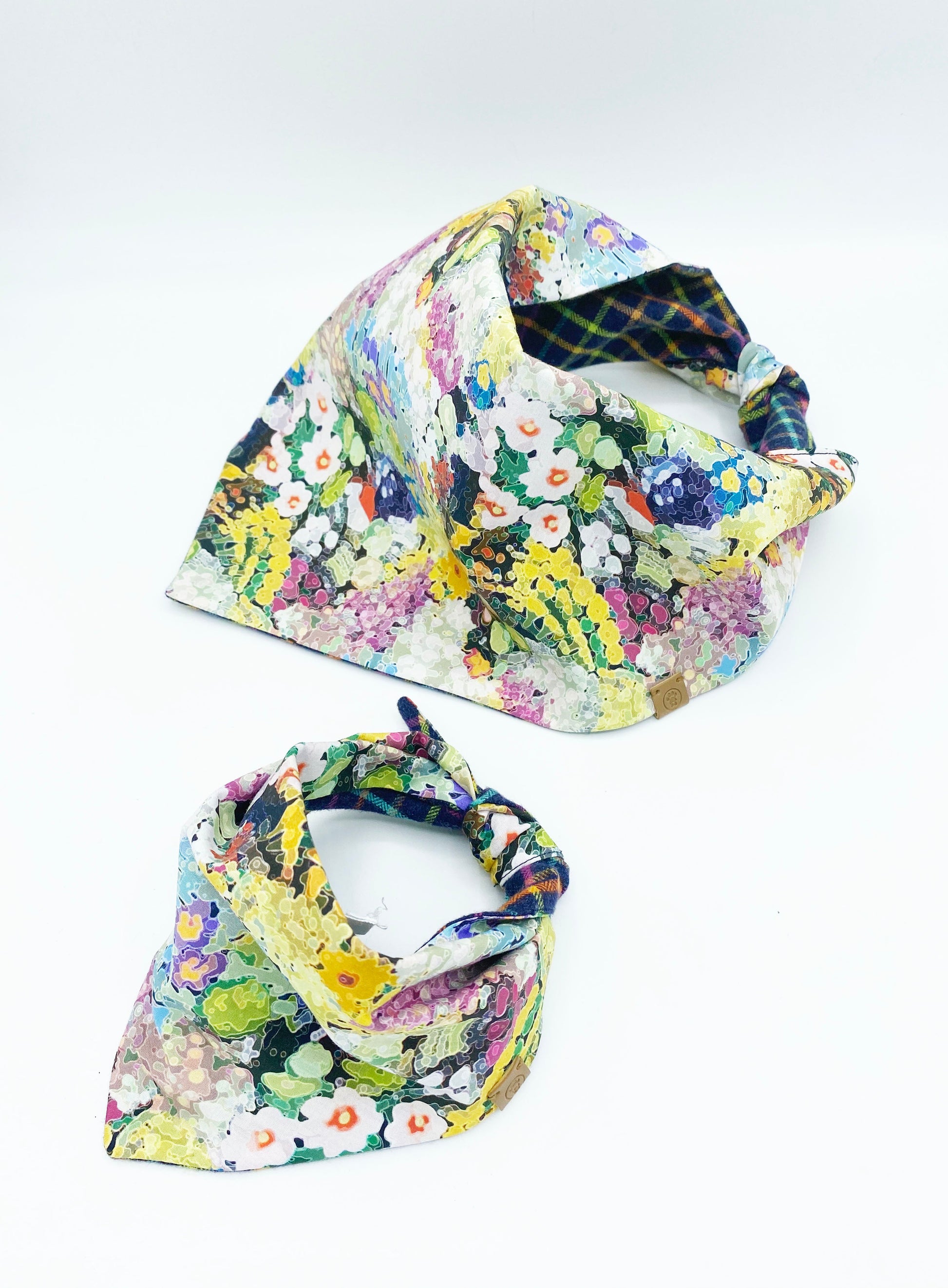 Two floral-patterned headbands on a white background