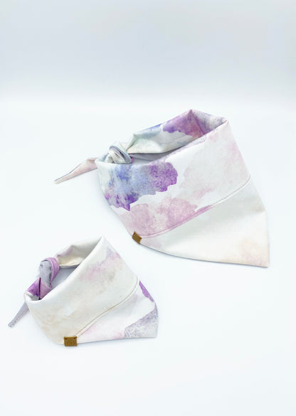 Two dog bandanas with watercolor design on a white background
