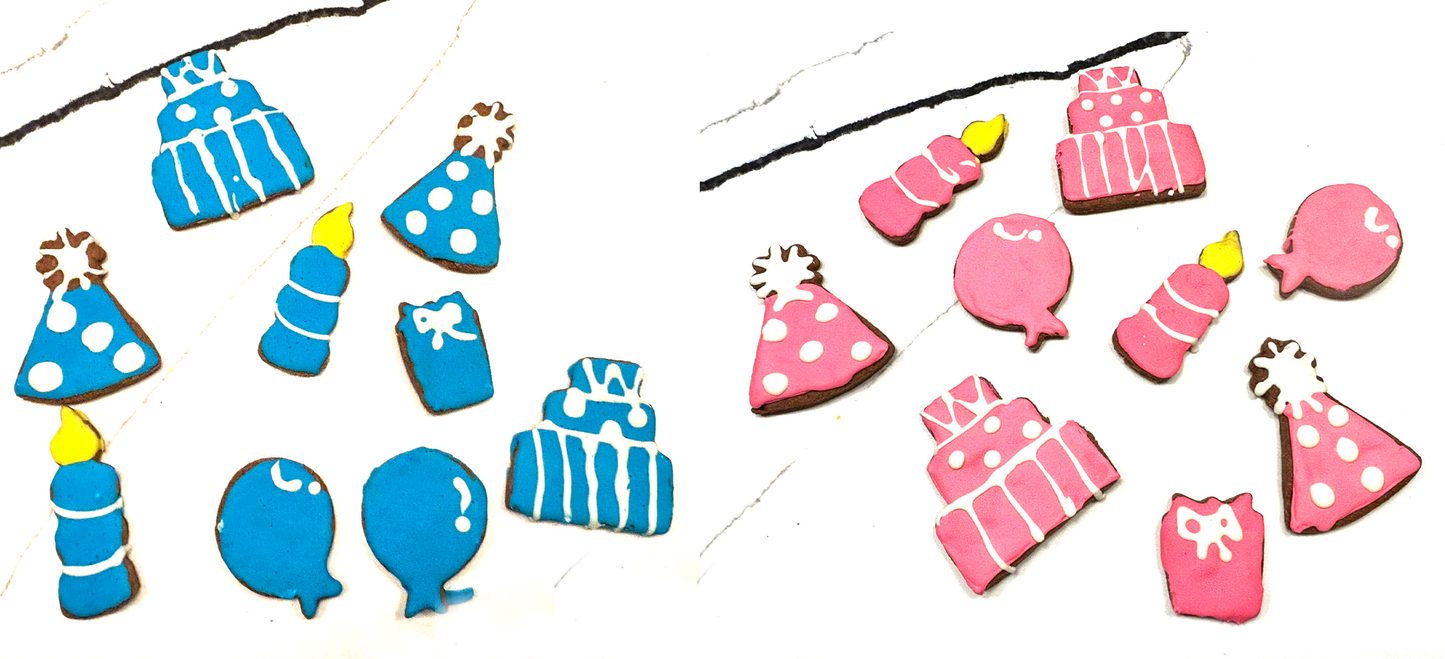 Colorful birthday-themed cookies including cakes, balloons, and presents on a white background.