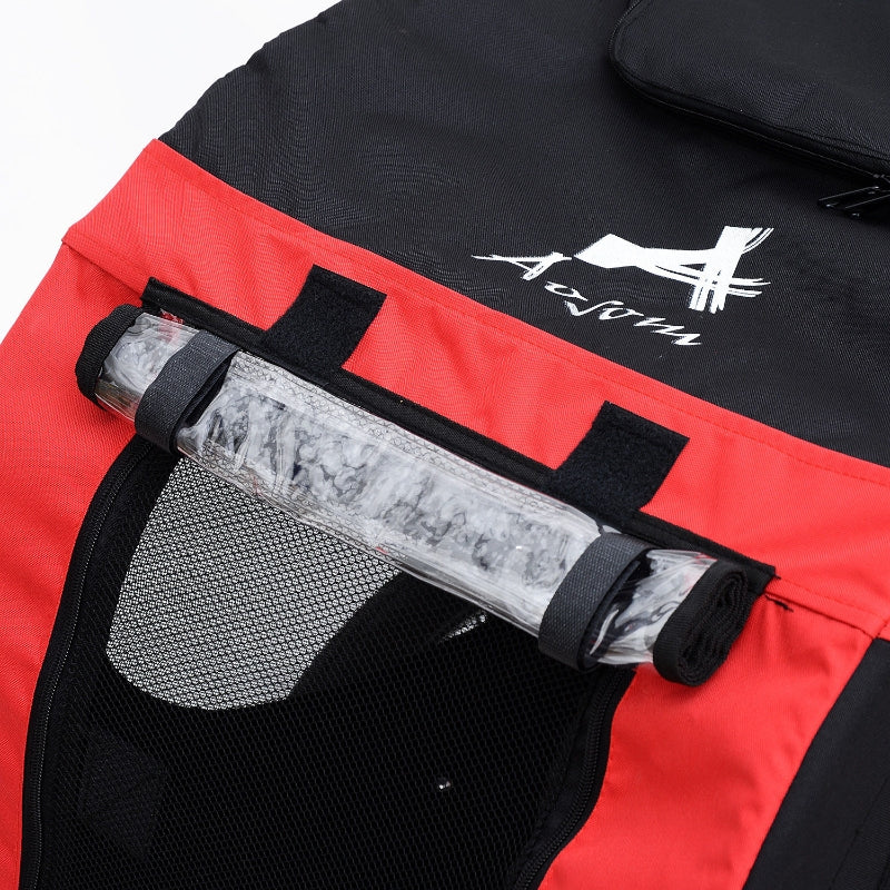 Red and black bag with a rolled-up mat inside, featuring a brand logo.