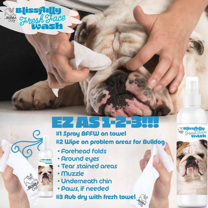 Dog being cleaned with a fresh face wash product, showing hands applying the product and a bottle of the product.