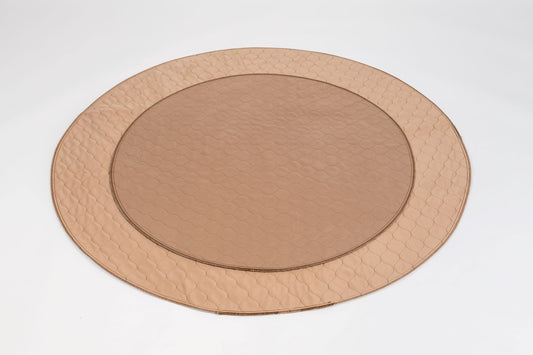 Round copper metal tray on a white background