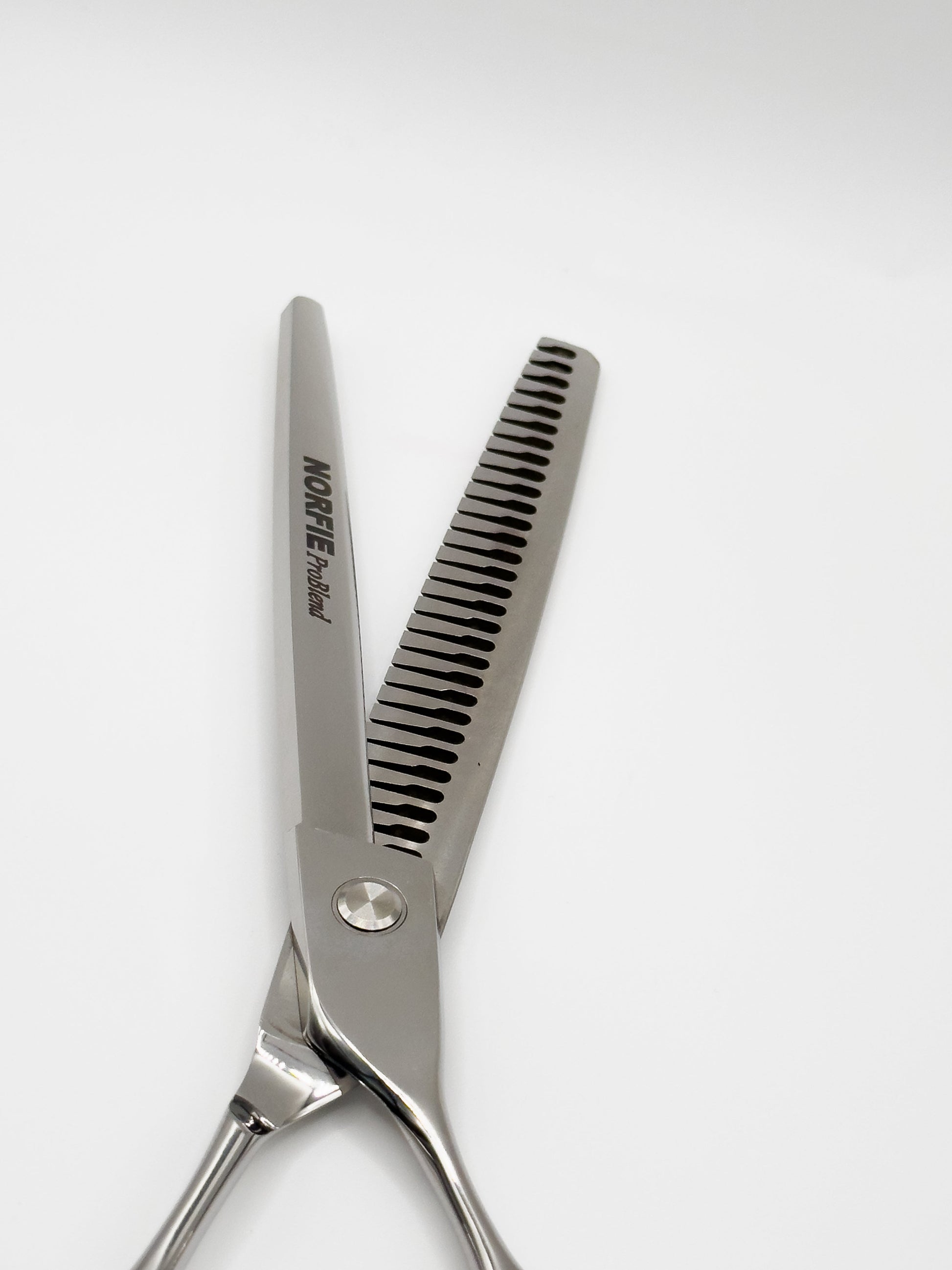 Hair cutting scissors with 'Norfie' branding on a white background