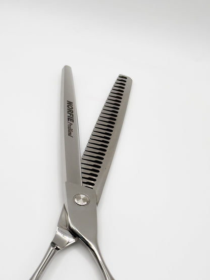 Hair cutting scissors with 'Norfie' branding on a white background