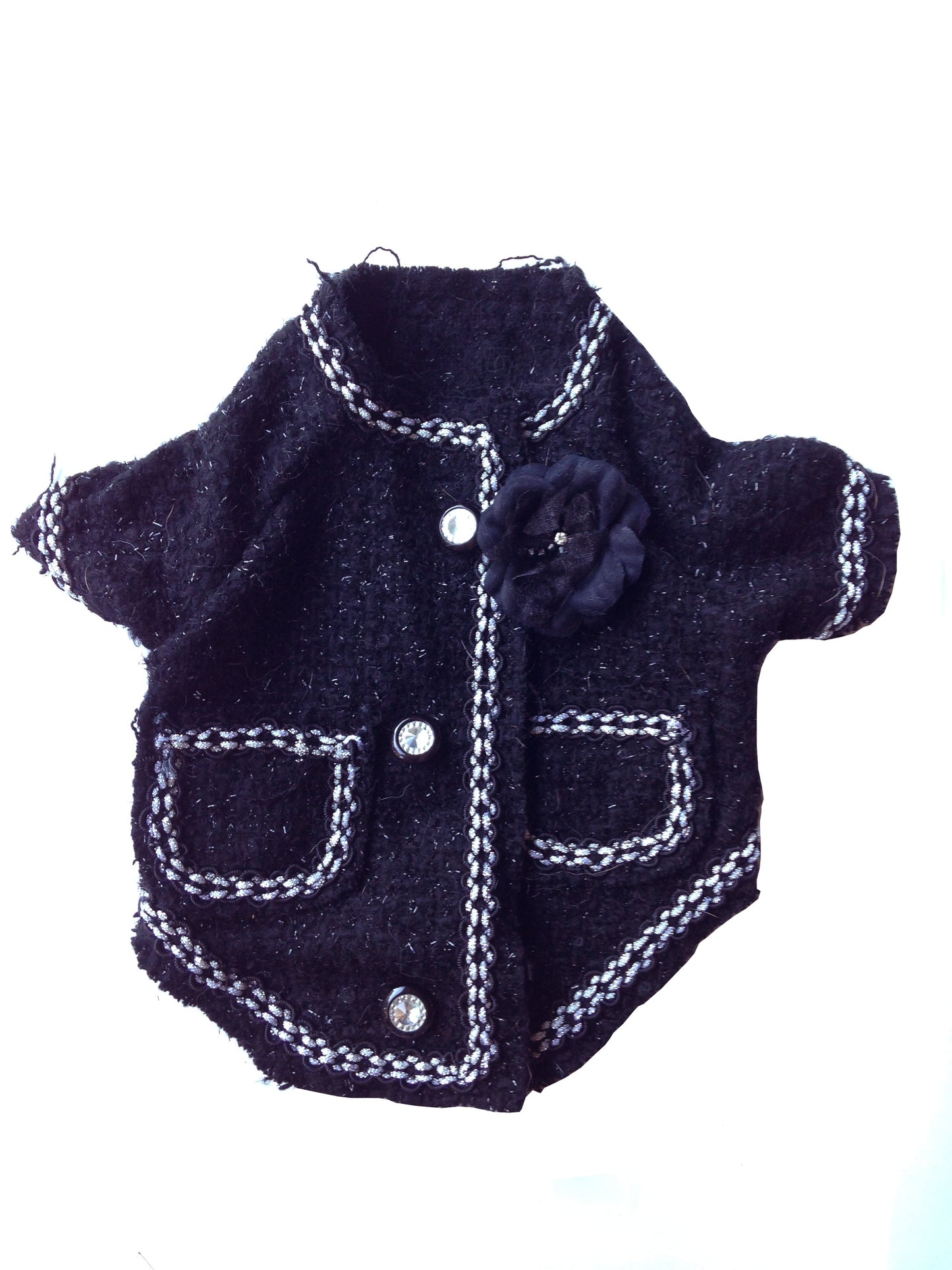 Black dog coat with white stitching on a white background