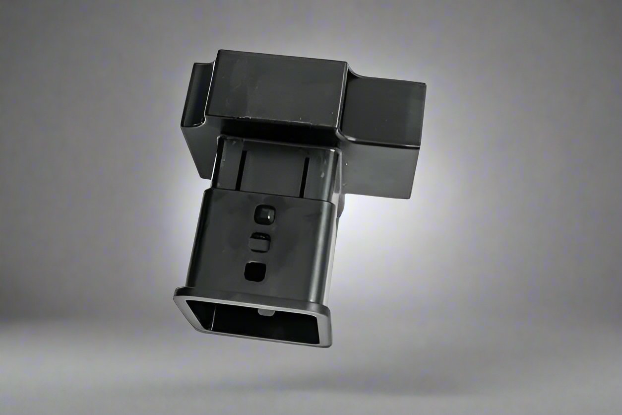 Black electronic component on a gray background