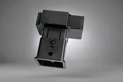 Black electronic component on a gray background