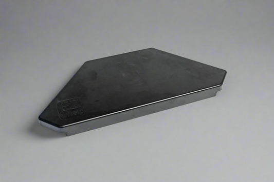 Black metal angle iron on a gray background