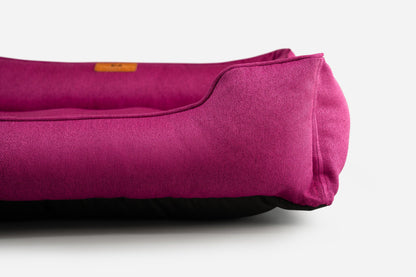 Purple yoga mat with a brand label on a white background