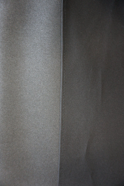Close-up of gray fabric with a subtle pattern