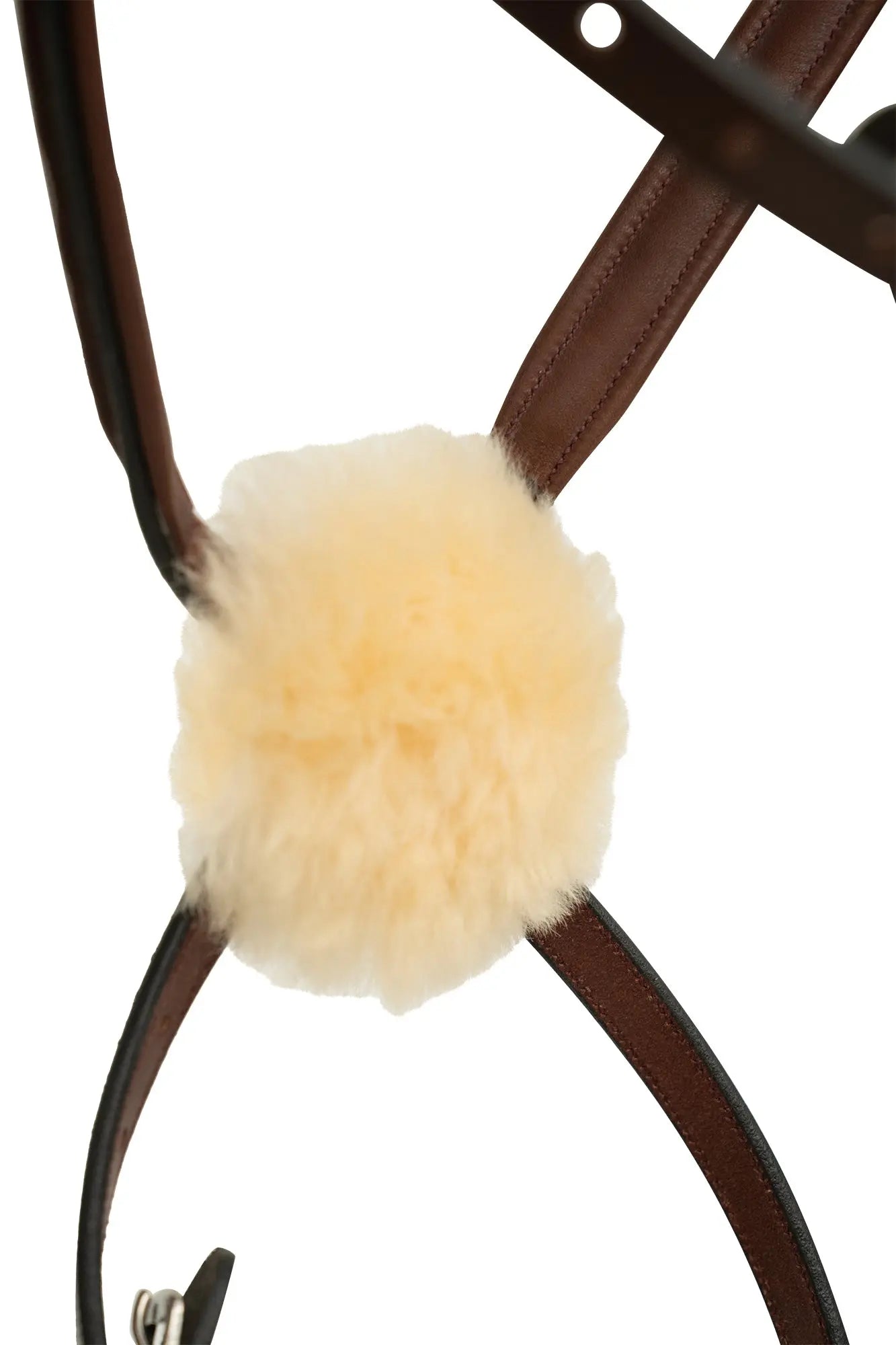 Close-up of a horse bridle with a beige leather patch on a white background