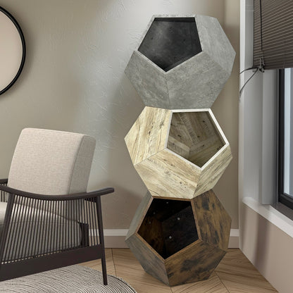 Geometrically shaped planters stacked in a living room setting with a chair and window.