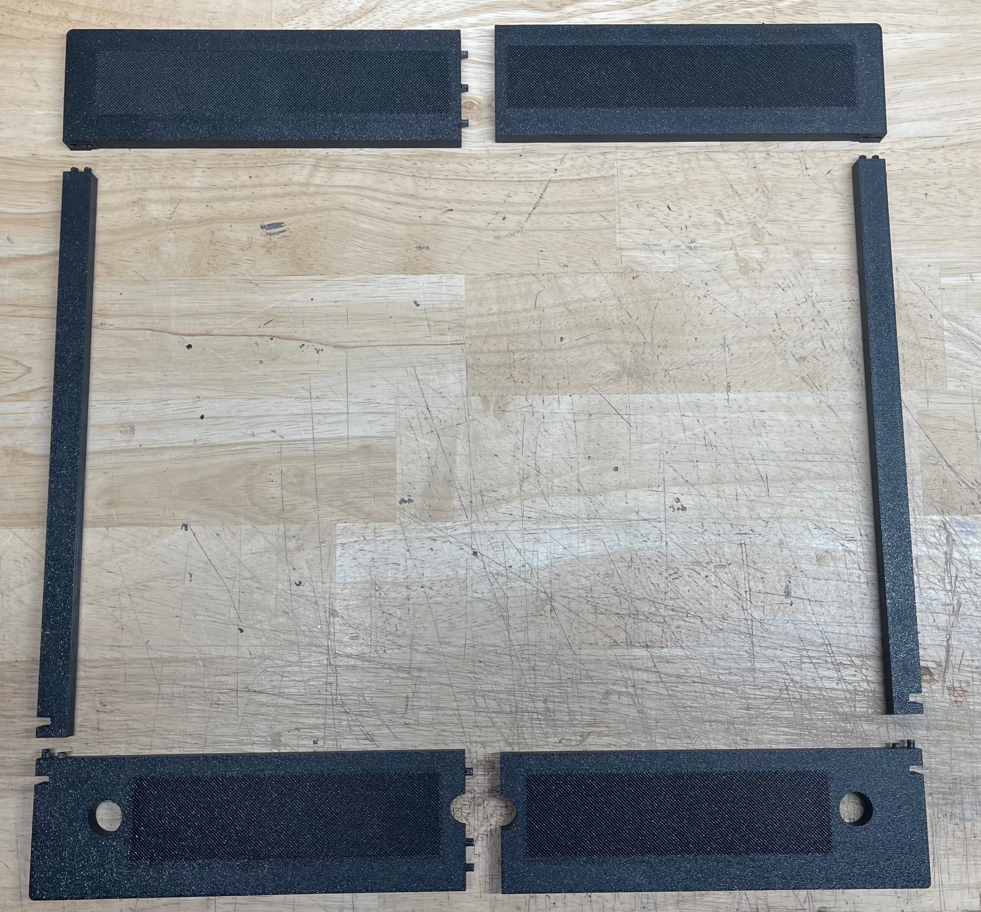 Black rubber mat set on a wooden surface