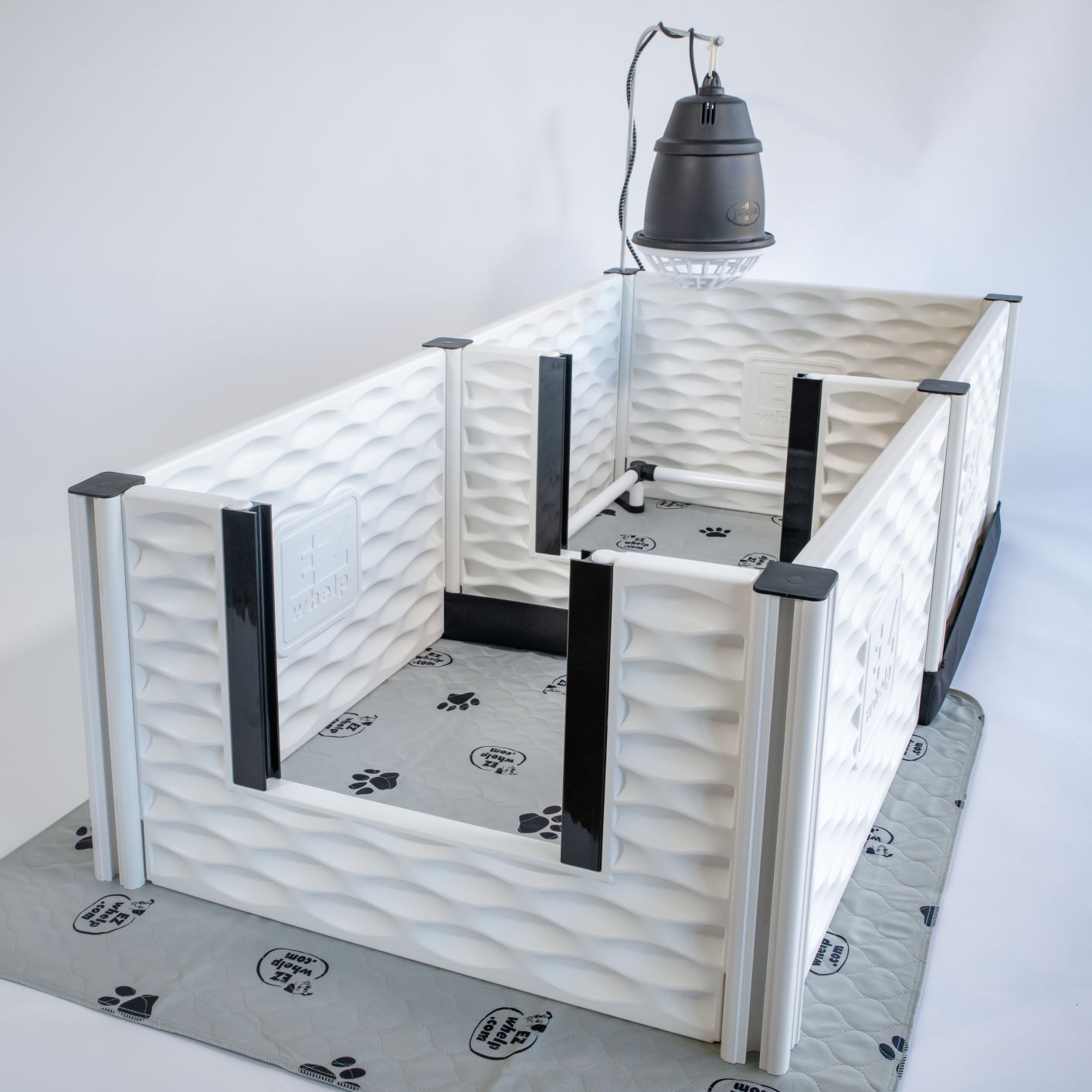 Pet playpen with a light fixture on a white background