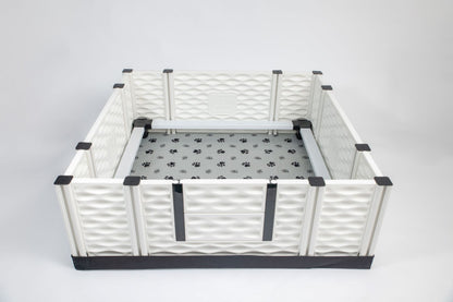 Pet playpen with a gray mat on a white background