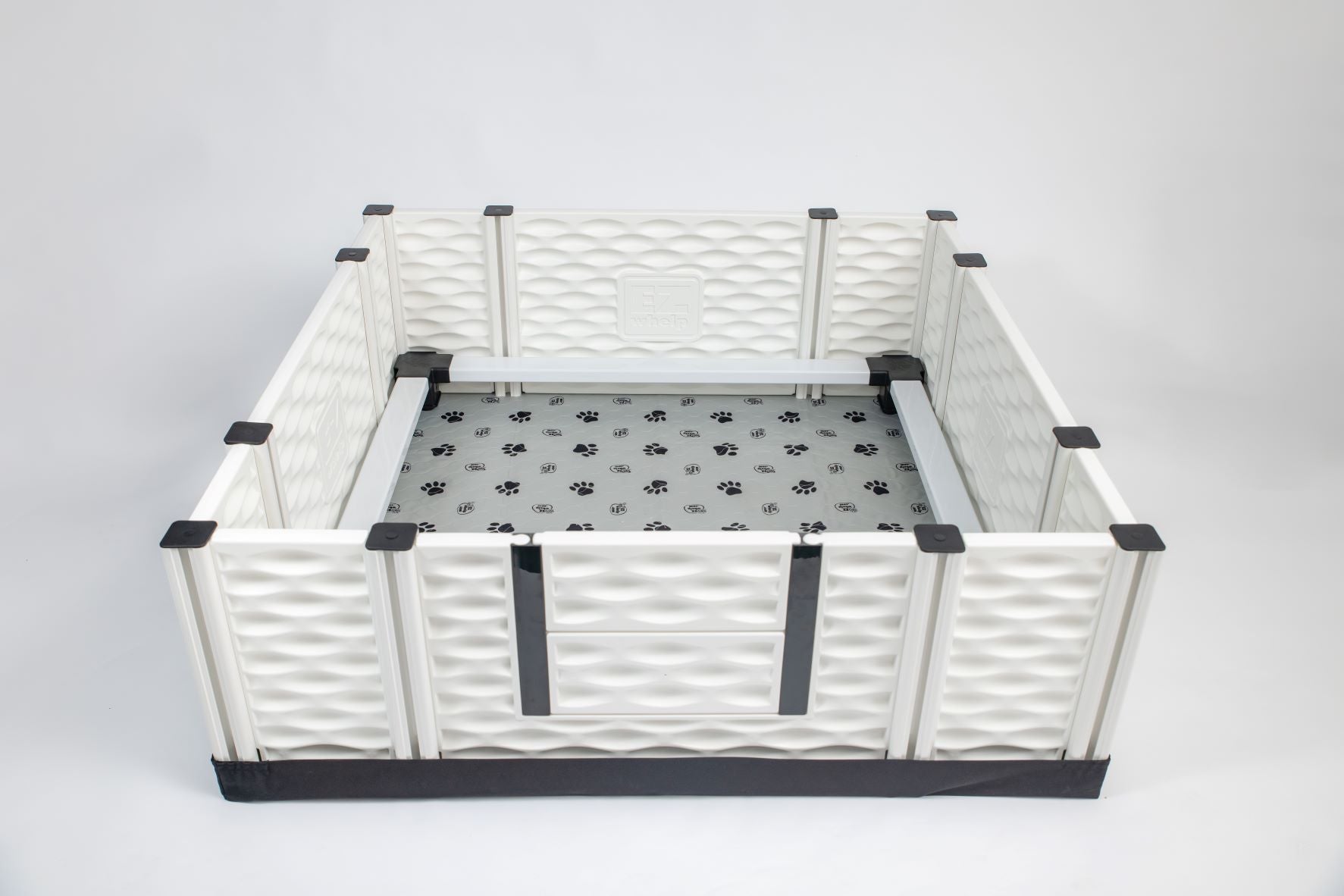 Pet playpen with a gray mat on a white background