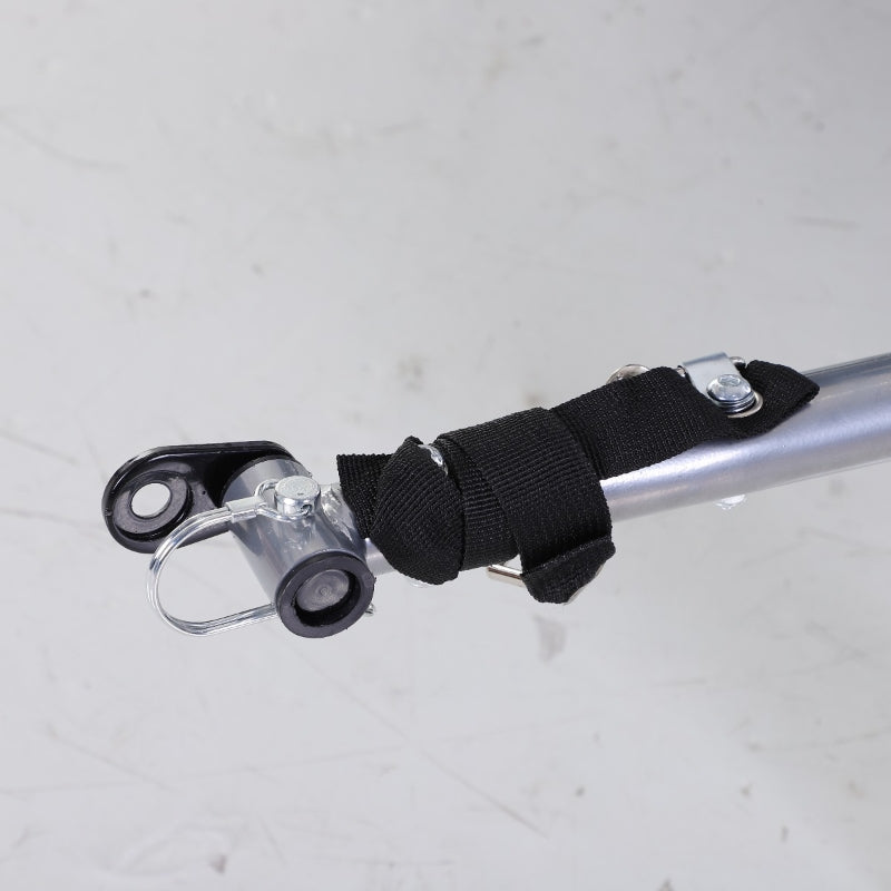 Black strap with metal clips on a white background