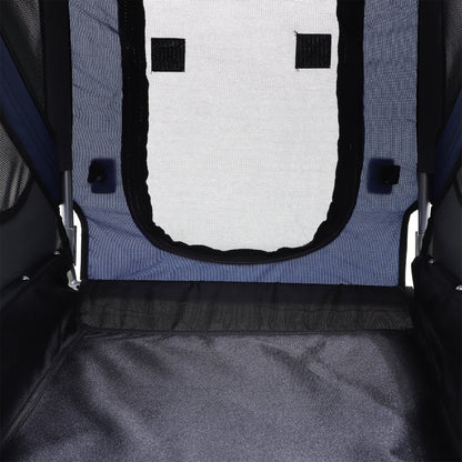 Close-up of a pet carrier with a mesh door and black trim.