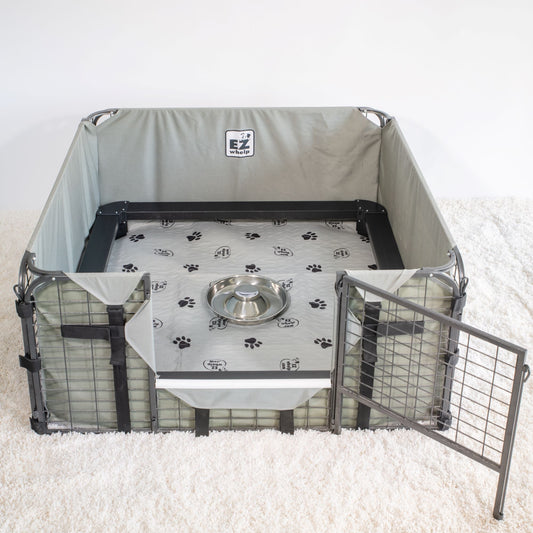Pet playpen with a mat and bowl on a white background