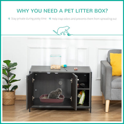 Pet litter box inside a cabinet with a cat using it, in a room with a plant and sofa.