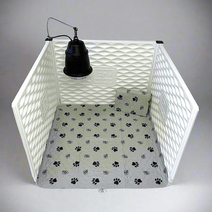 Pet crate with a light inside, featuring a paw print pattern on the floor.