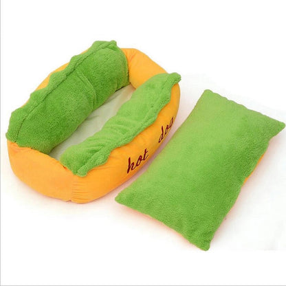 Plush hot dog toy with green napkin on a white background