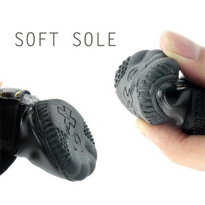 Black shoe with soft sole being held by a hand, labeled 'SOFT SOLE'.