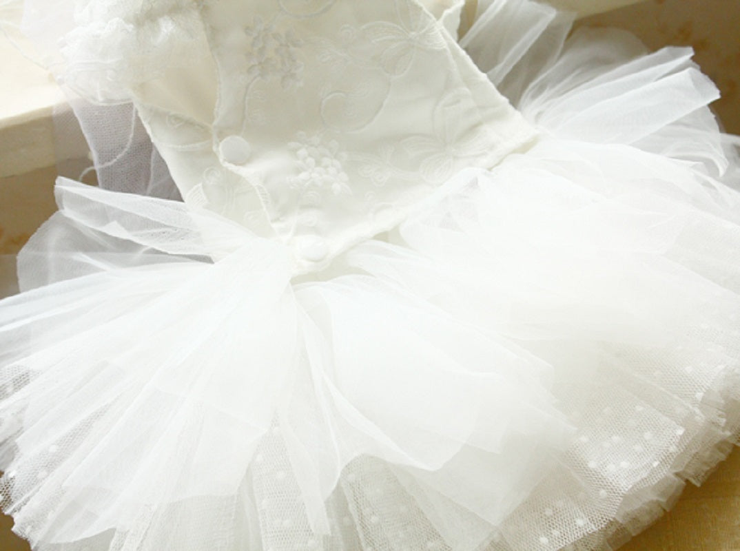 Close-up of a white tulle fabric with a soft focus background