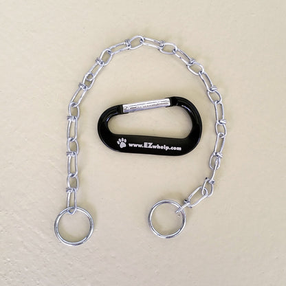 Dog training tool with chain and carabiner on a beige background