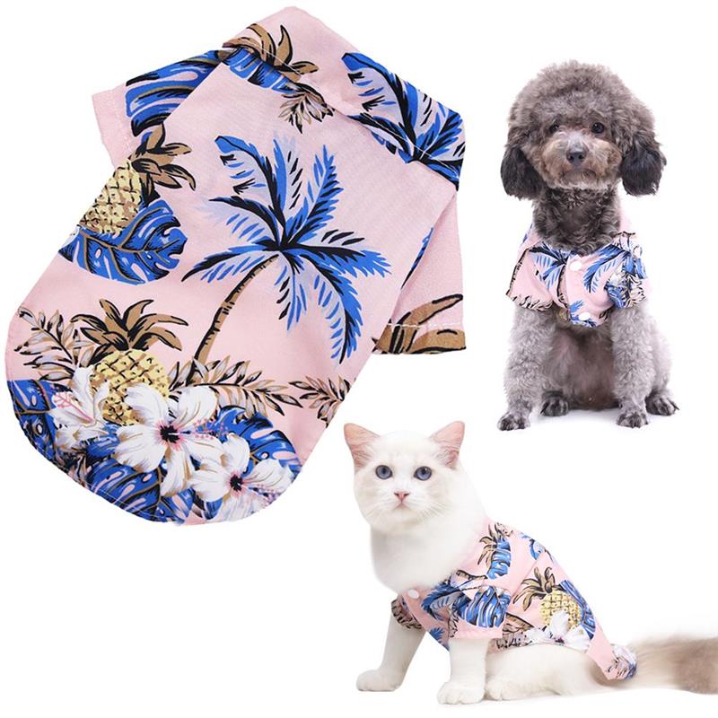 Hawaiian-style pet shirts for dogs and cats with floral and pineapple design on a white background.