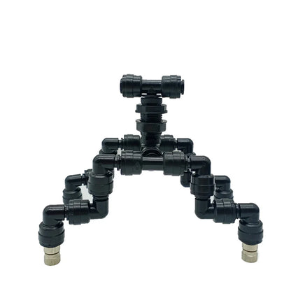 Black plumbing valve and connector set on a white background