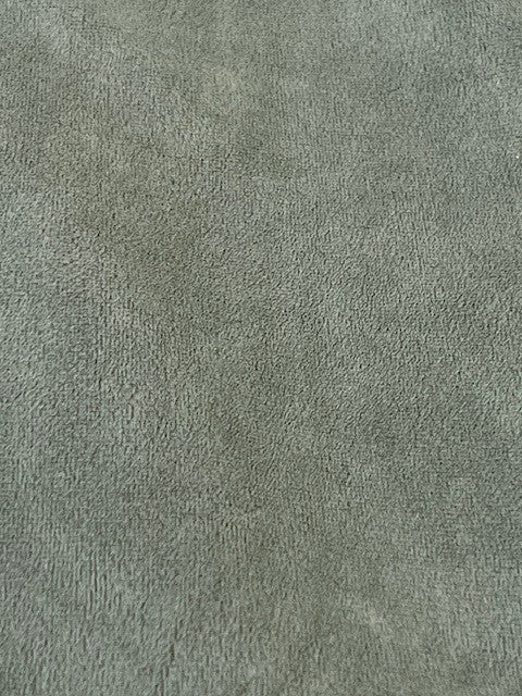 Solid green color swatch with a textured pattern