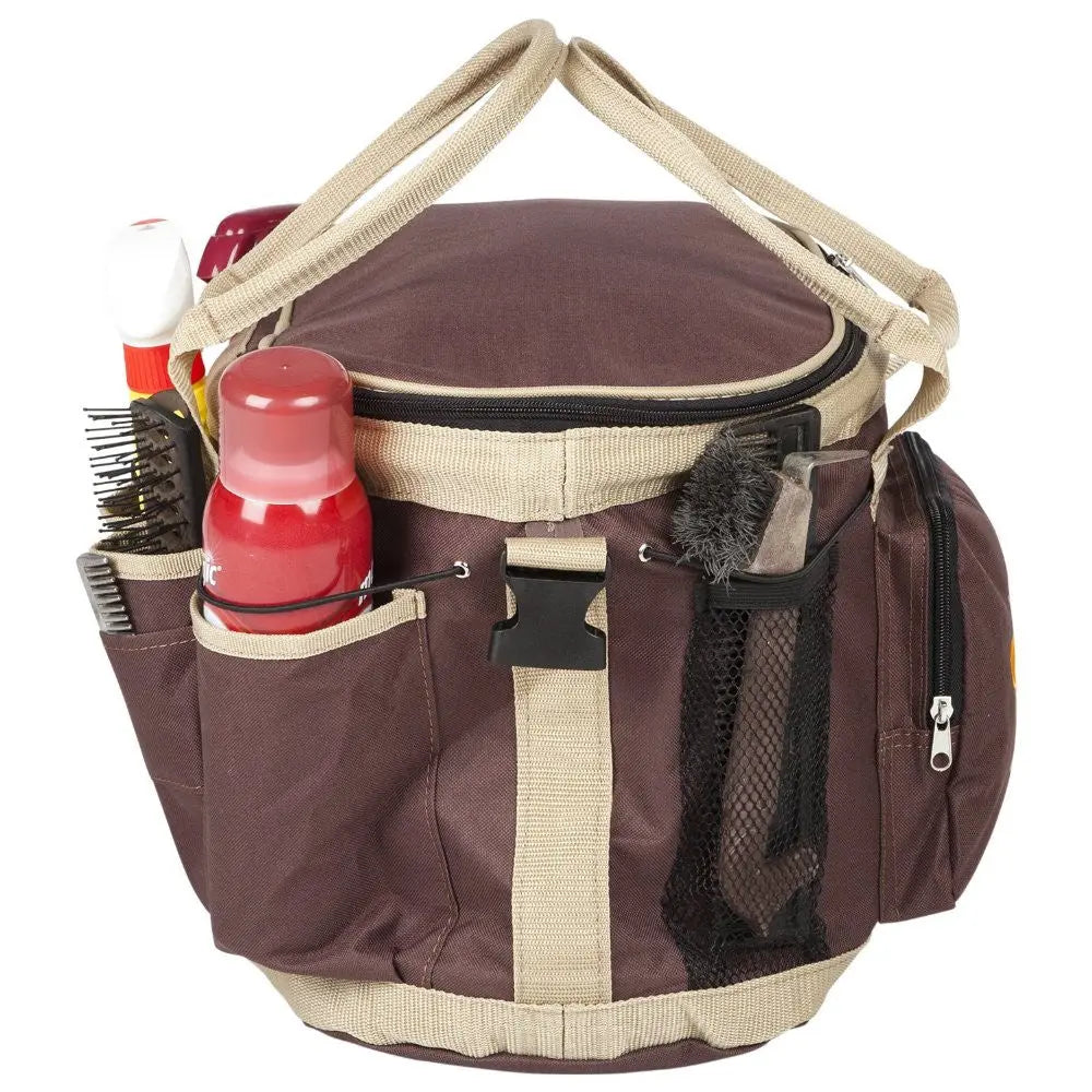 Brown and beige grooming bag with various items on a white background