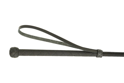 Black leather whip on a white background