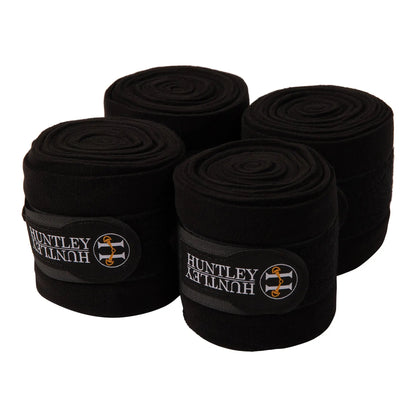 Four black bandages with Huntley & Huntley branding on a white background