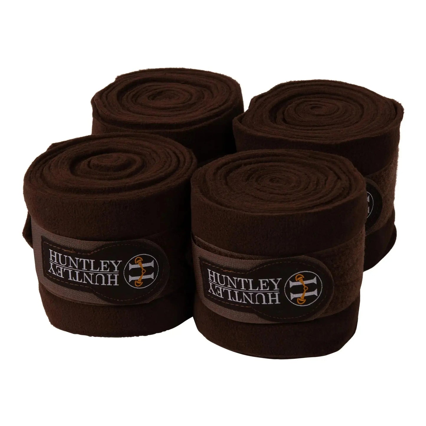Four brown rolls of Huntley bandage on a white background