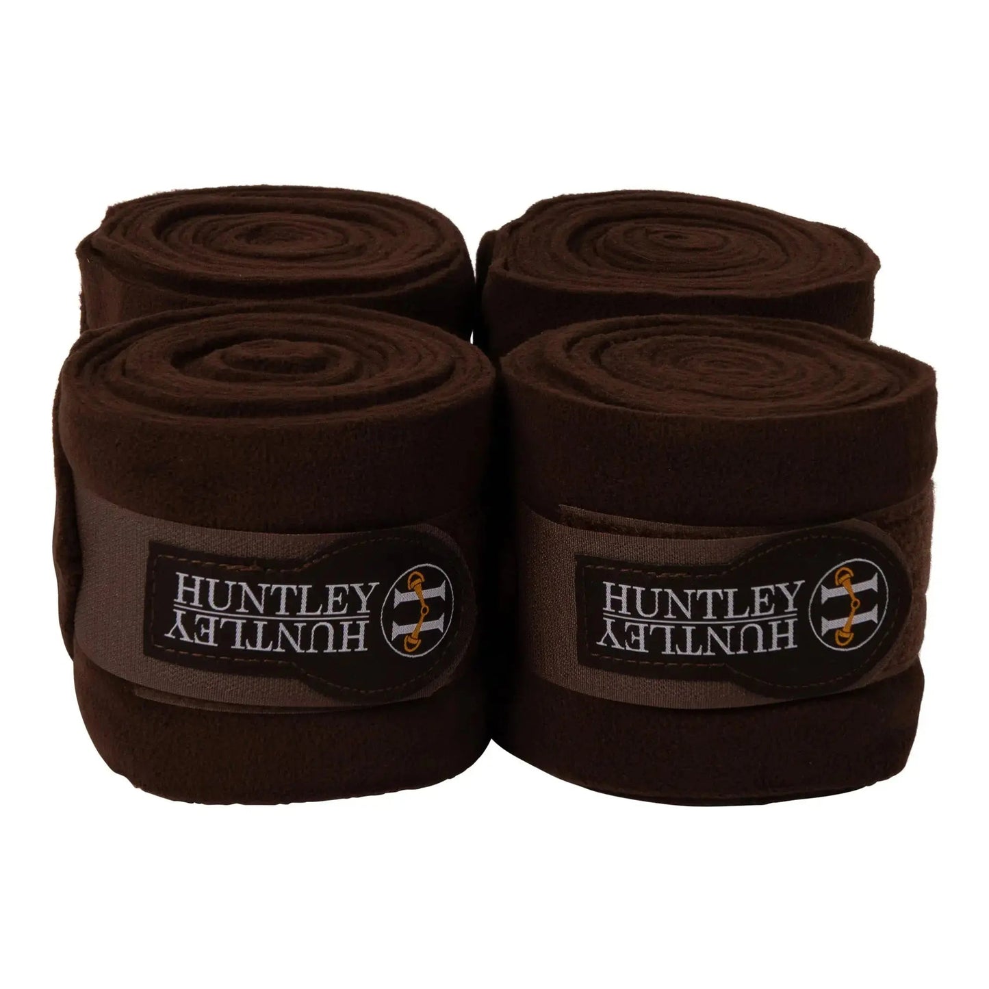 Four rolls of Huntley brown bandage on a white background