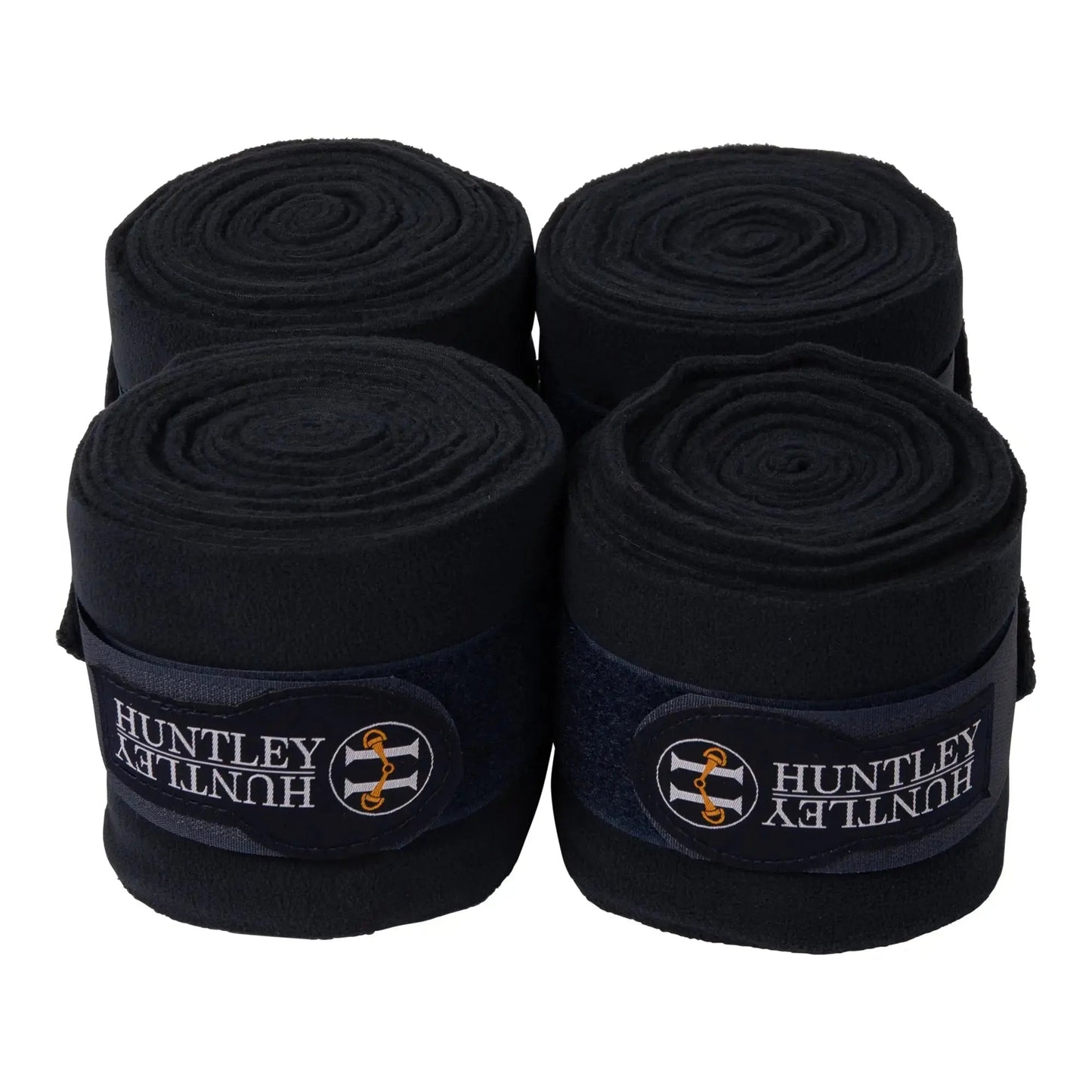 Four rolls of black Huntley bandage on a white background