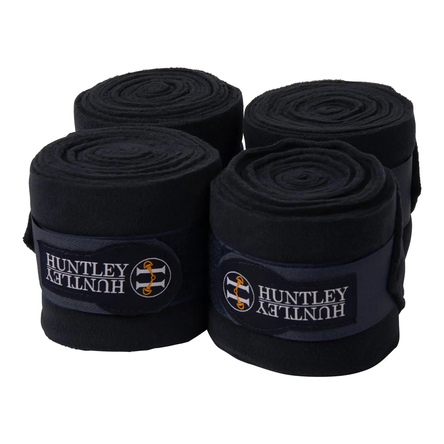 Four rolls of black Huntley bandage on a white background
