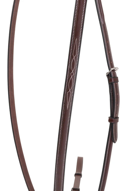 Brown leather bridle with intricate design on a white background